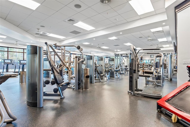 workout area with a drop ceiling