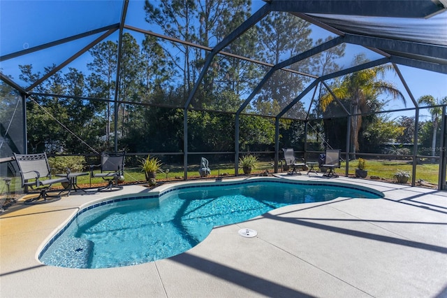 view of pool featuring a lanai and a patio