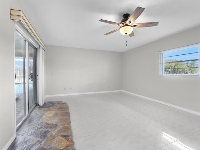 spare room featuring ceiling fan