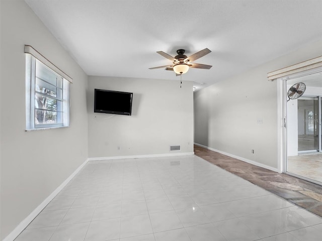 unfurnished room featuring ceiling fan