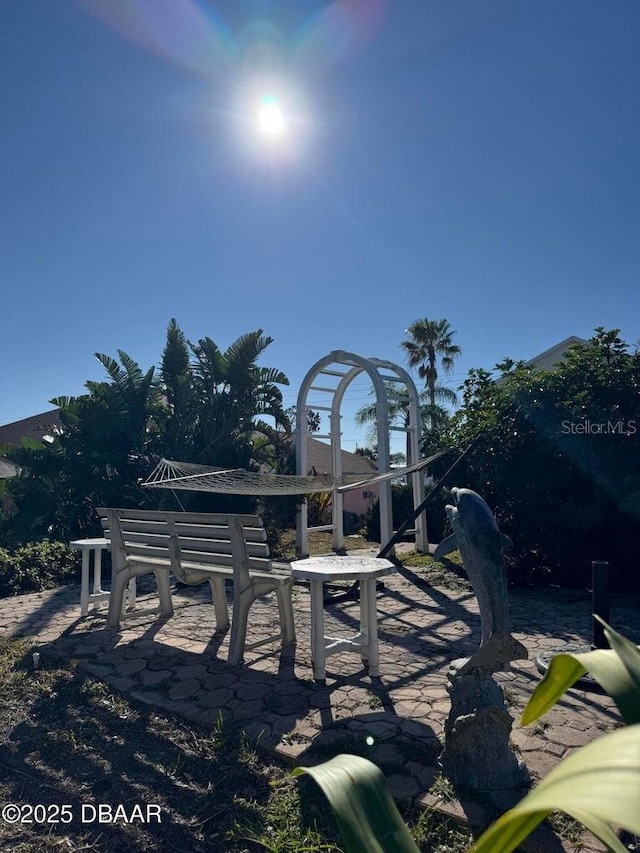 view of home's community featuring a patio area