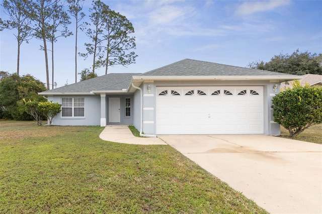 ranch-style home featuring a front lawn and a garage