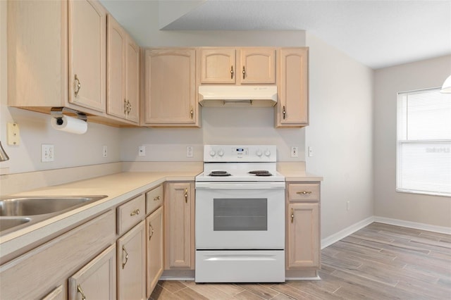 kitchen featuring sink, a wealth of natural light, white range with electric stovetop, and light brown cabinets