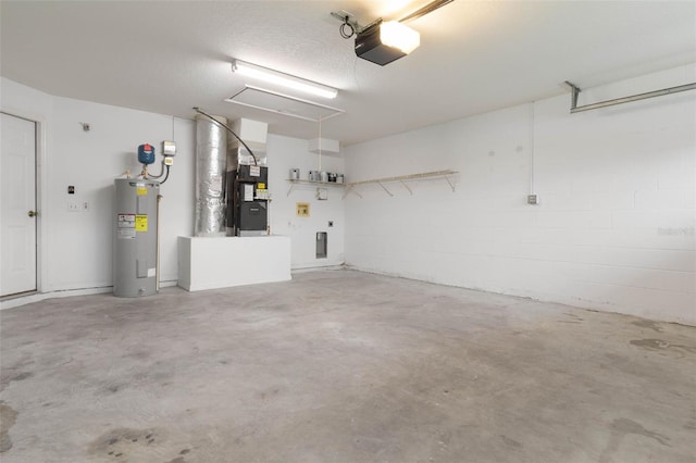 garage with electric water heater, heating unit, and a garage door opener