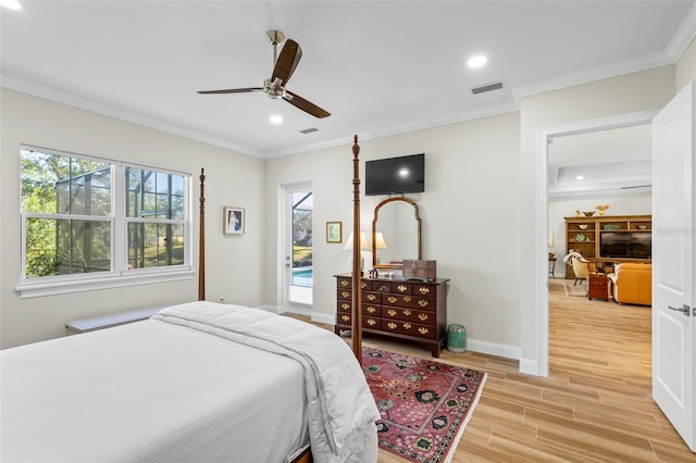 bedroom with ceiling fan, light hardwood / wood-style flooring, and ornamental molding