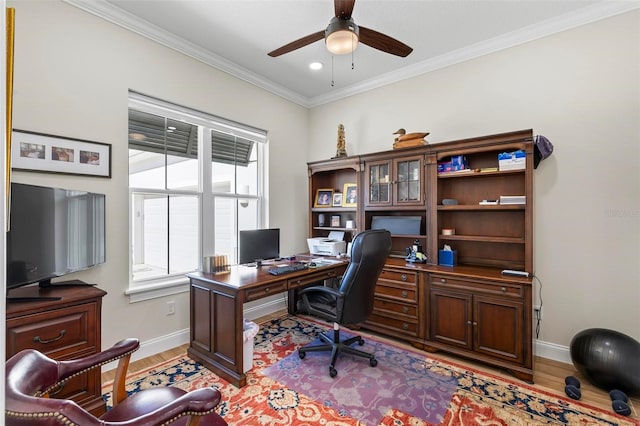 office area featuring light hardwood / wood-style floors, ceiling fan, and ornamental molding