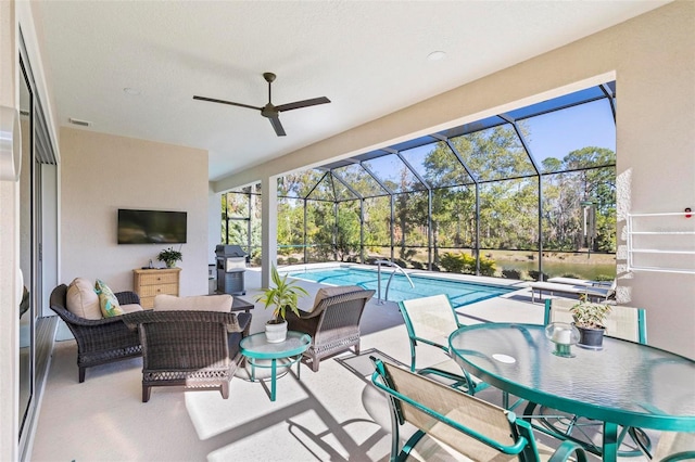 view of patio with a lanai and outdoor lounge area