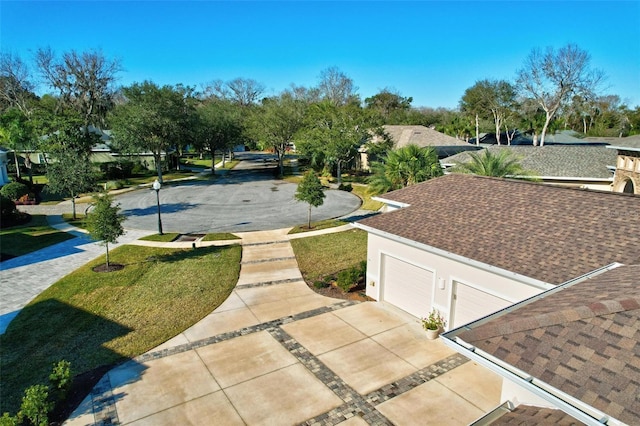 surrounding community featuring a lawn