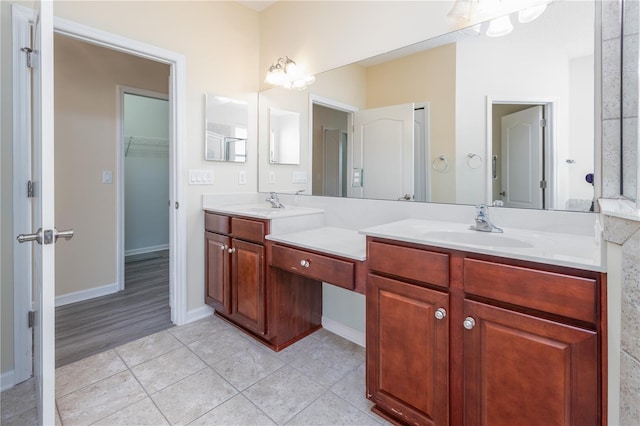 bathroom with vanity and tile patterned floors