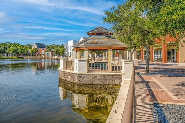 dock area featuring a gazebo and a water view