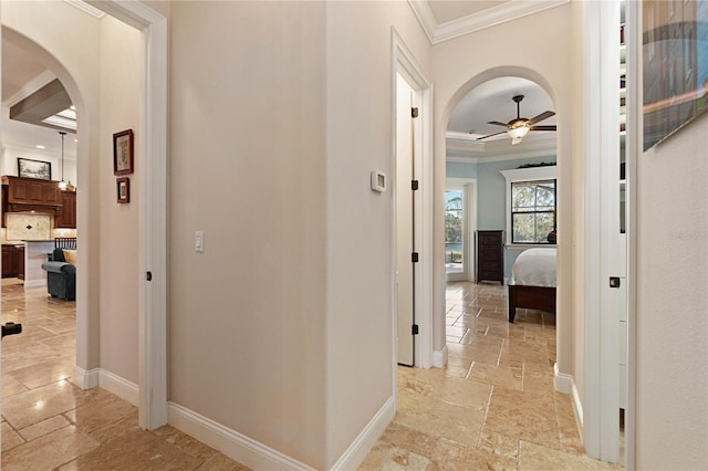 hallway featuring crown molding