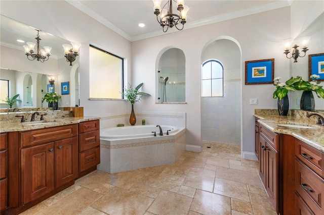 bathroom featuring vanity, an inviting chandelier, and ornamental molding