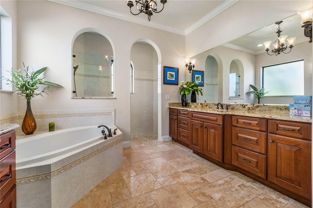 bathroom with crown molding, vanity, independent shower and bath, and an inviting chandelier