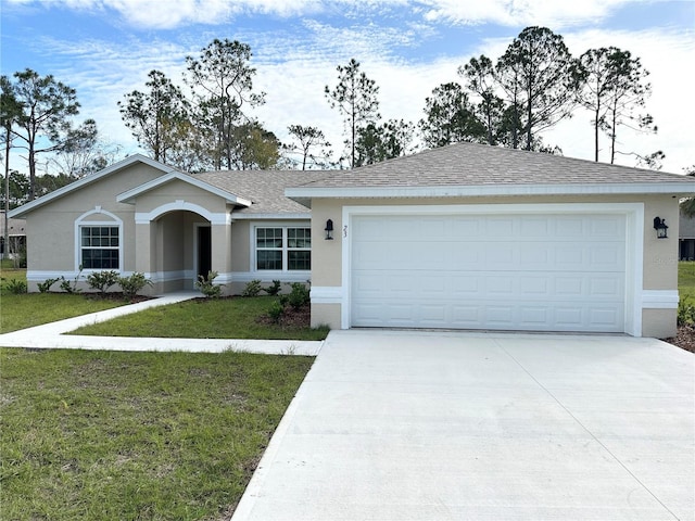 single story home with a front yard and a garage