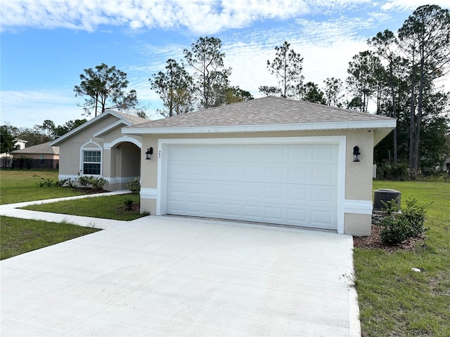 ranch-style house featuring a garage, central air condition unit, and a front yard