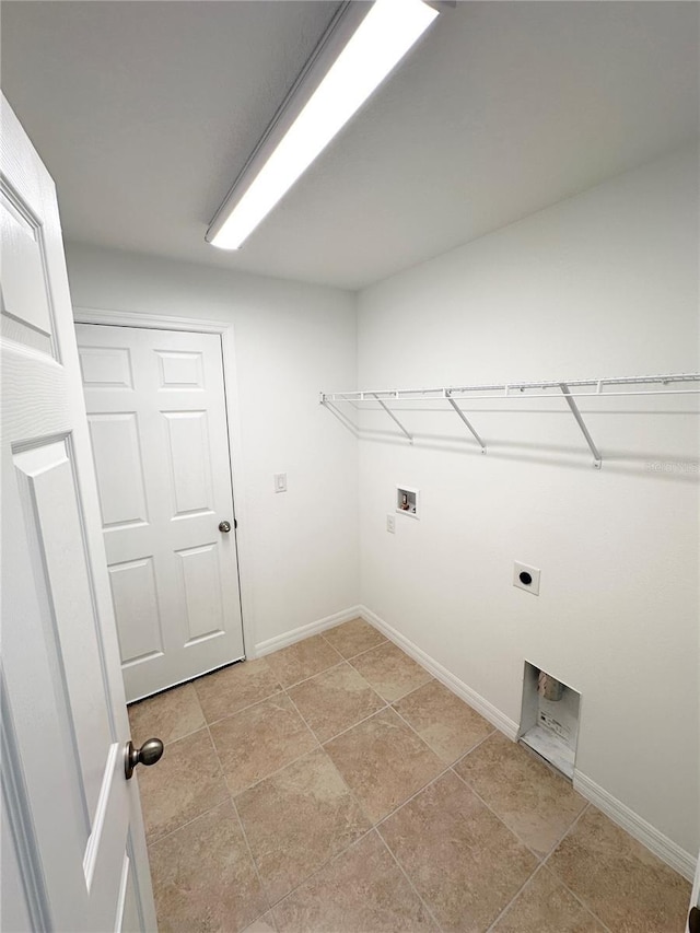 clothes washing area featuring washer hookup and hookup for an electric dryer