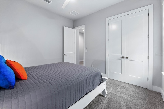 bedroom with a closet, carpet floors, and ceiling fan