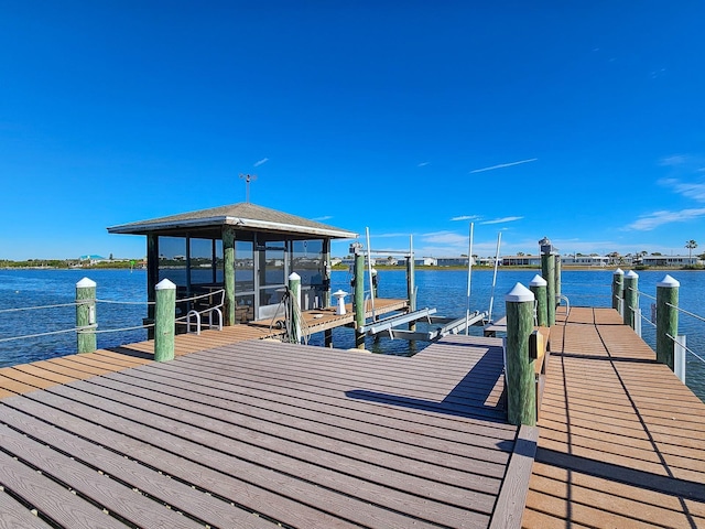 dock area featuring a water view