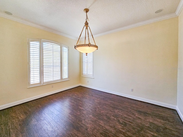 unfurnished dining area with crown molding, dark wood-type flooring, and a textured ceiling