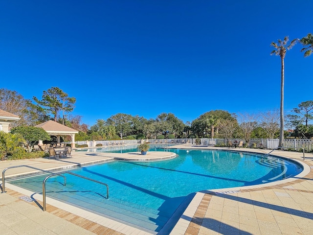 view of pool with a gazebo and a patio area