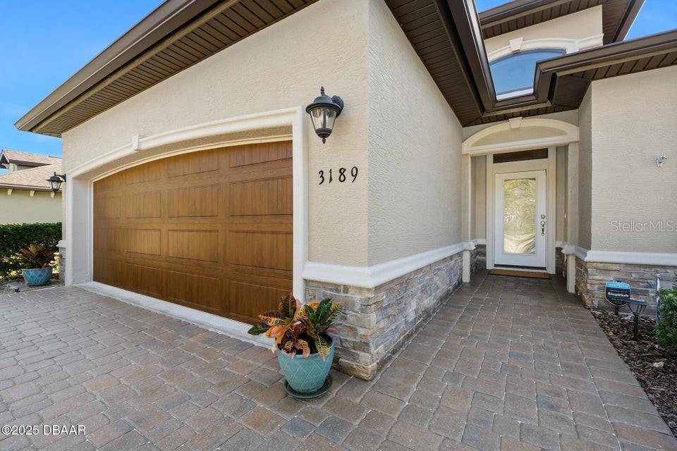 property entrance featuring a garage