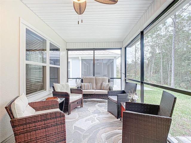 sunroom / solarium with ceiling fan