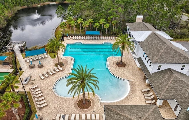 view of swimming pool featuring a patio