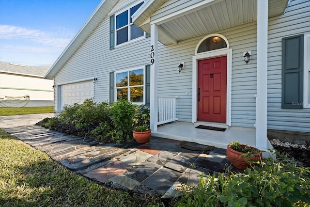 property entrance with a garage