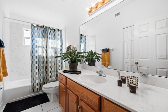 full bathroom with tile patterned flooring, toilet, vanity, and shower / tub combo with curtain