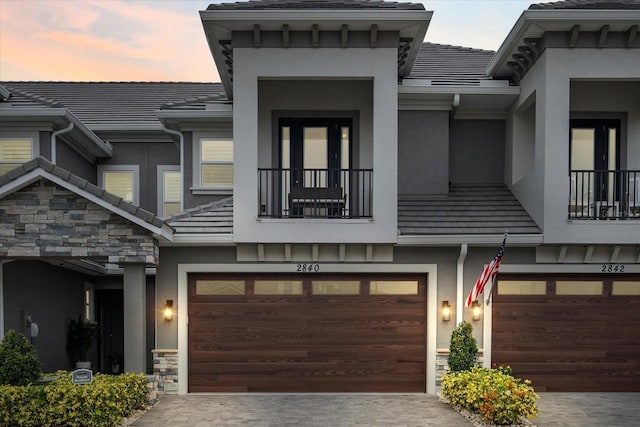 view of front of property with a garage