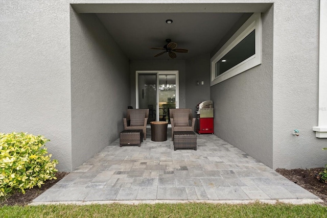 view of patio / terrace with ceiling fan