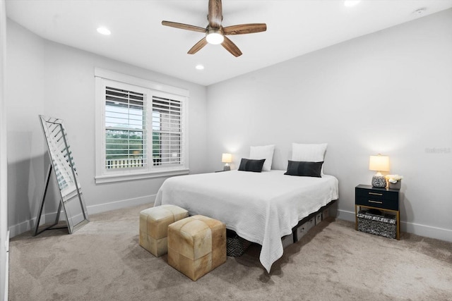 carpeted bedroom featuring ceiling fan