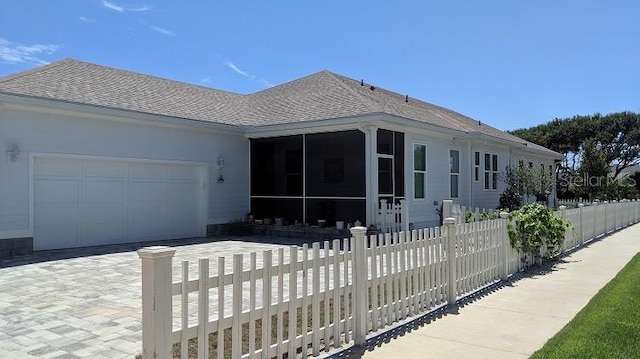 ranch-style home featuring a garage