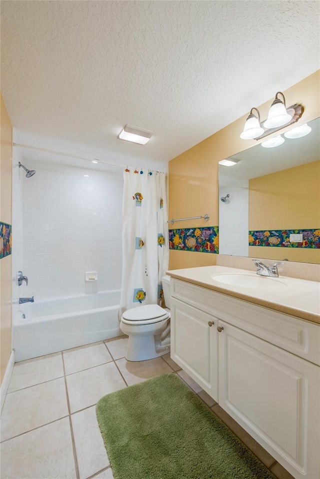 full bathroom with tile patterned flooring, toilet, vanity, a textured ceiling, and shower / tub combo with curtain