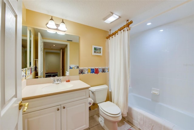 full bathroom featuring a textured ceiling, tile patterned flooring, toilet, shower / bath combo, and vanity