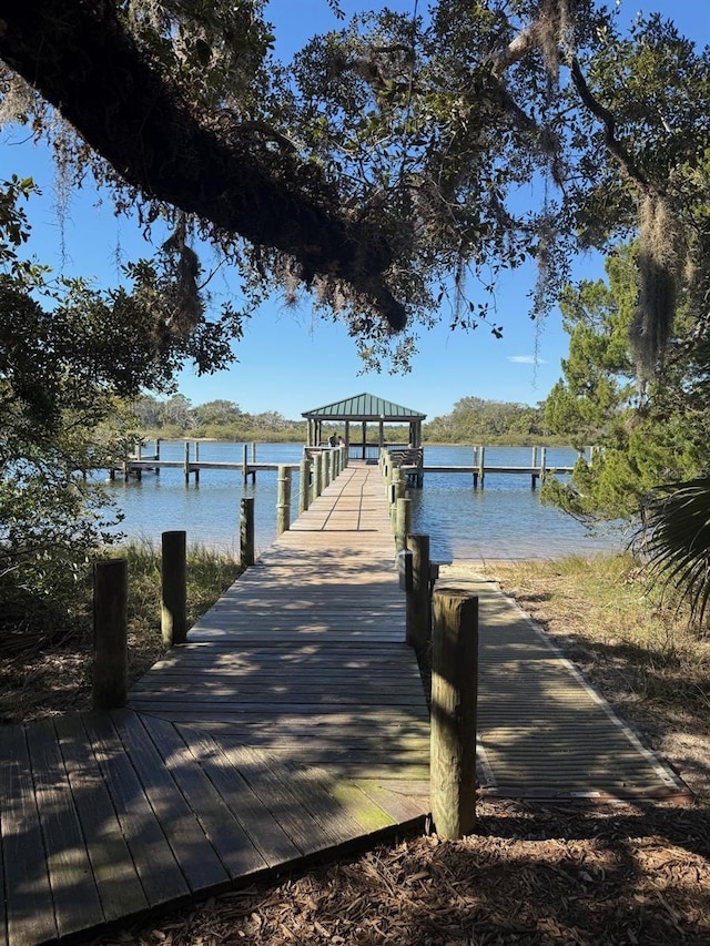 view of dock with a water view