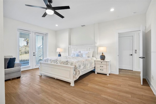 bedroom featuring access to exterior, french doors, ceiling fan, and light wood-type flooring