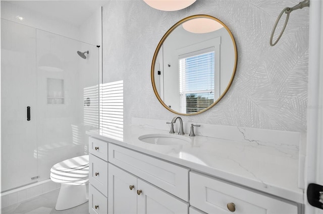 bathroom with vanity, toilet, and an enclosed shower