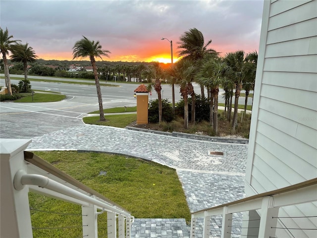 view of home's community with a yard