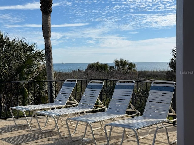 wooden terrace with a water view