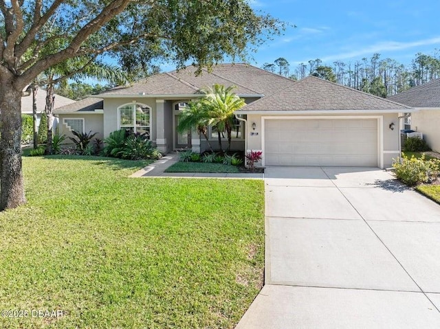 single story home featuring a garage and a front lawn