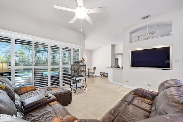 carpeted living room featuring ceiling fan