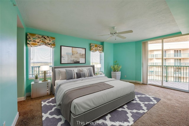 carpeted bedroom with ceiling fan, a textured ceiling, and access to outside