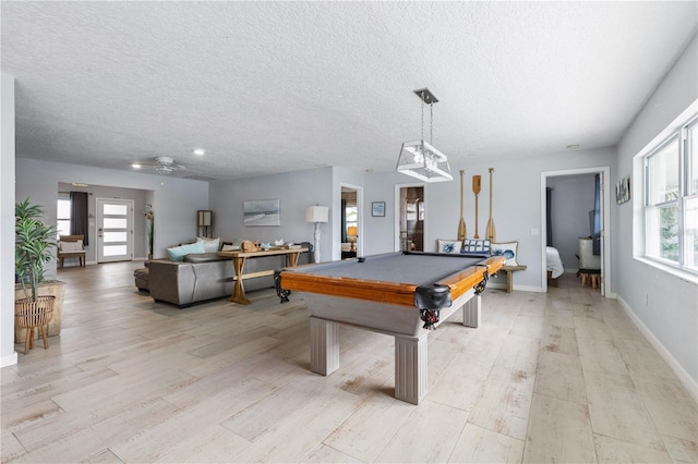 rec room with ceiling fan, light hardwood / wood-style flooring, and billiards