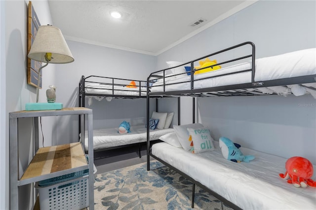 bedroom featuring crown molding