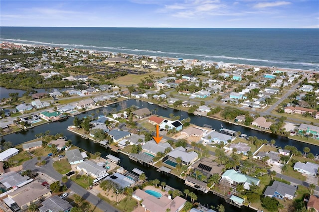 bird's eye view with a water view