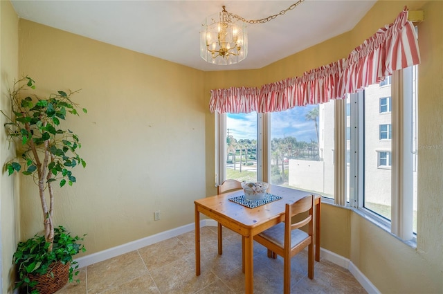 dining room with a chandelier