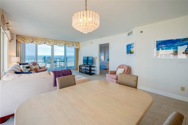 dining room with a chandelier