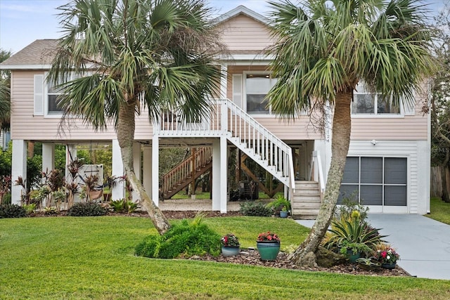 exterior space featuring a garage and a lawn