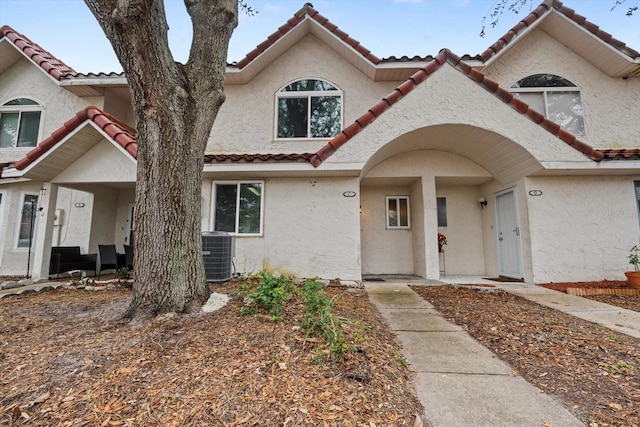 view of front of home featuring central AC unit